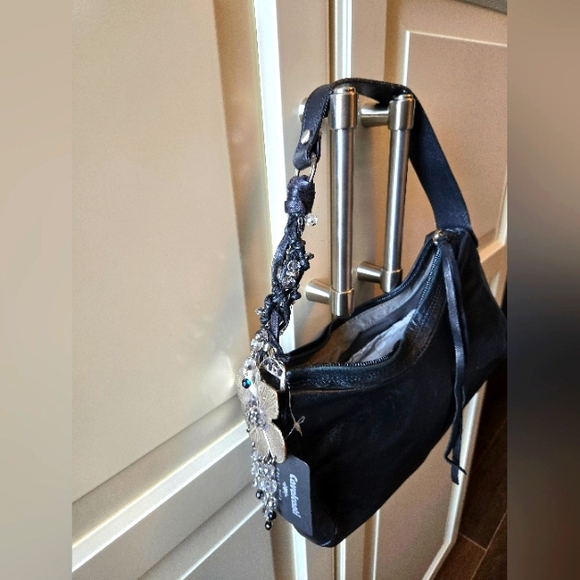 Black  leather hand bag with floral detail - Picture 12 of 14